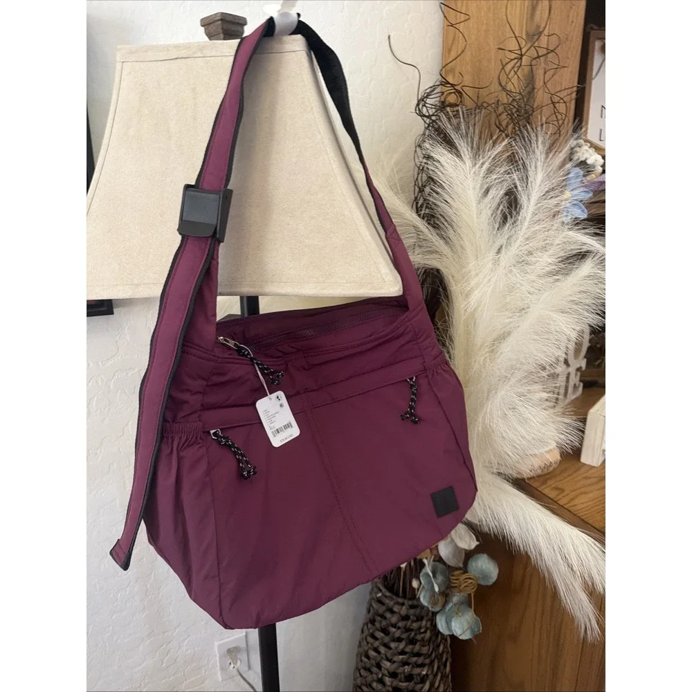 NWT Free People Checkmate Sling Carryall Bag Utility Puffer Deep Mulberry Purple